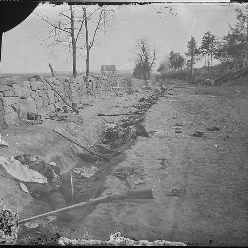 Confederate_dead_behind_stone_wall._The_6th._Maine_Inf._penetrated_the_Confederate_lines_at_this_point...._-_NARA_-_524930.jpg
