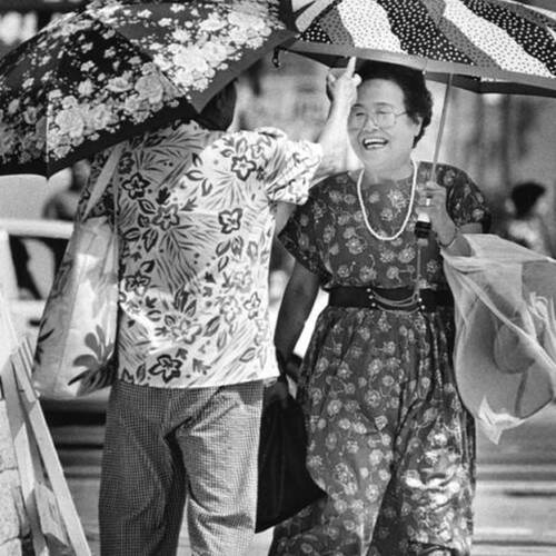 Women walking happily in Koreatown