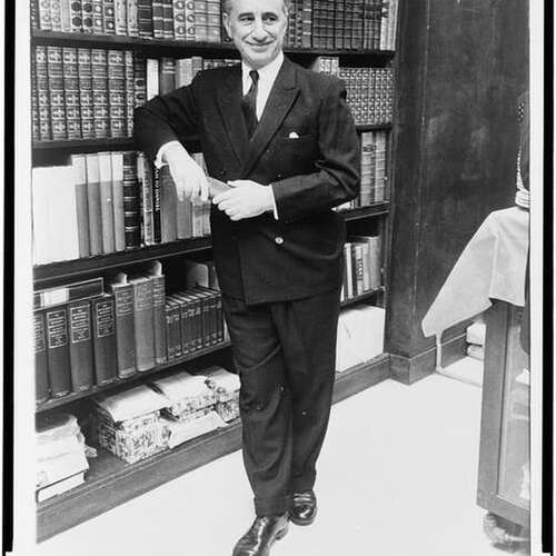 elia-kazan-full-length-portrait-standing-before-bookshelves-at-brentanos-book.jpg