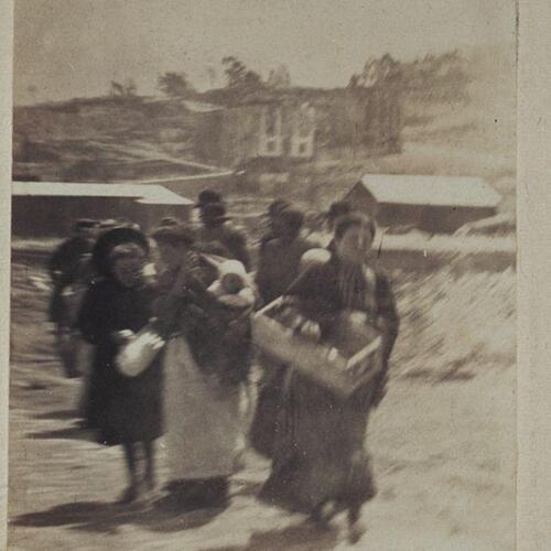 Italian immigrants walking and gathering outside after the San Francisco Earthquake.