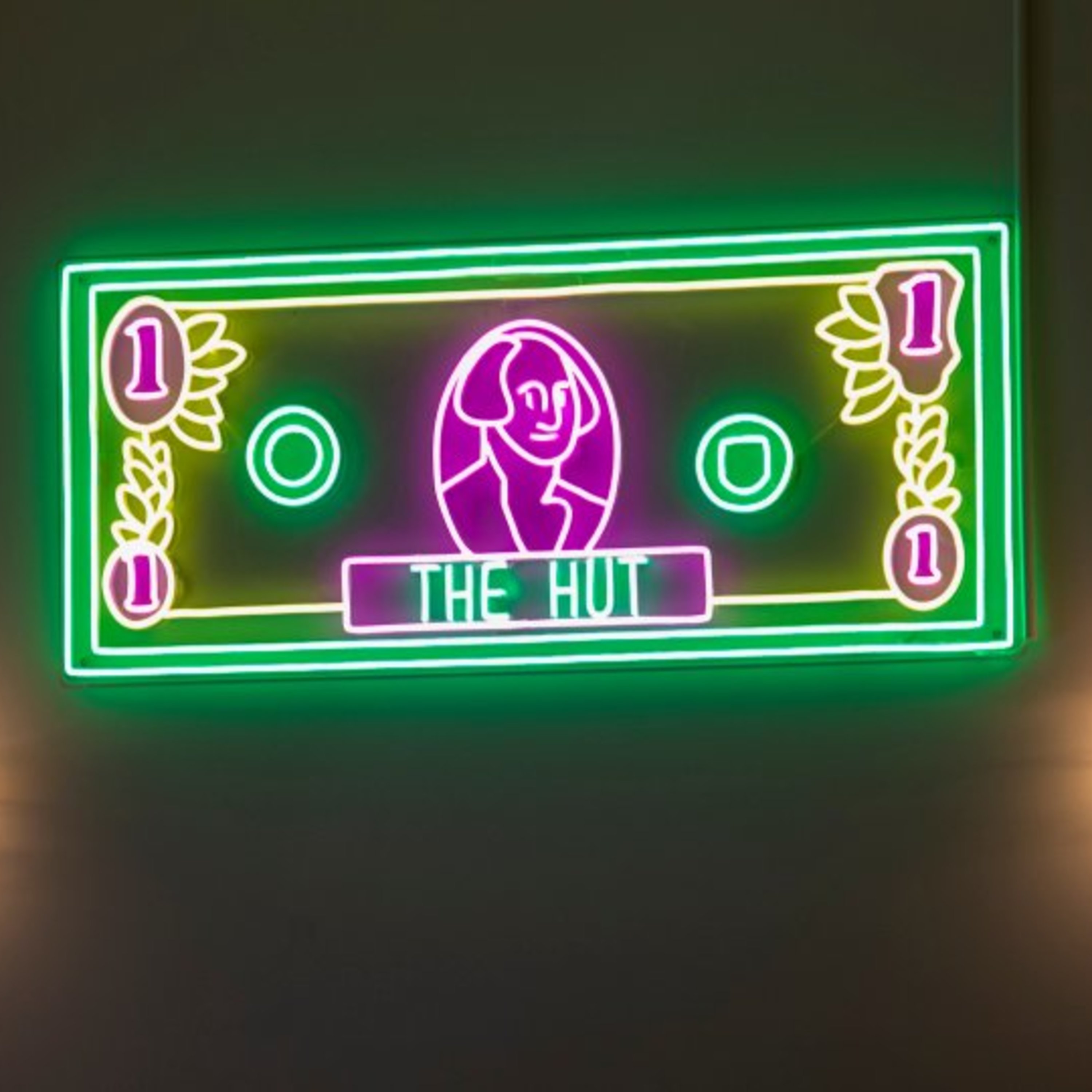 Neon Dollar Sign, The Hut