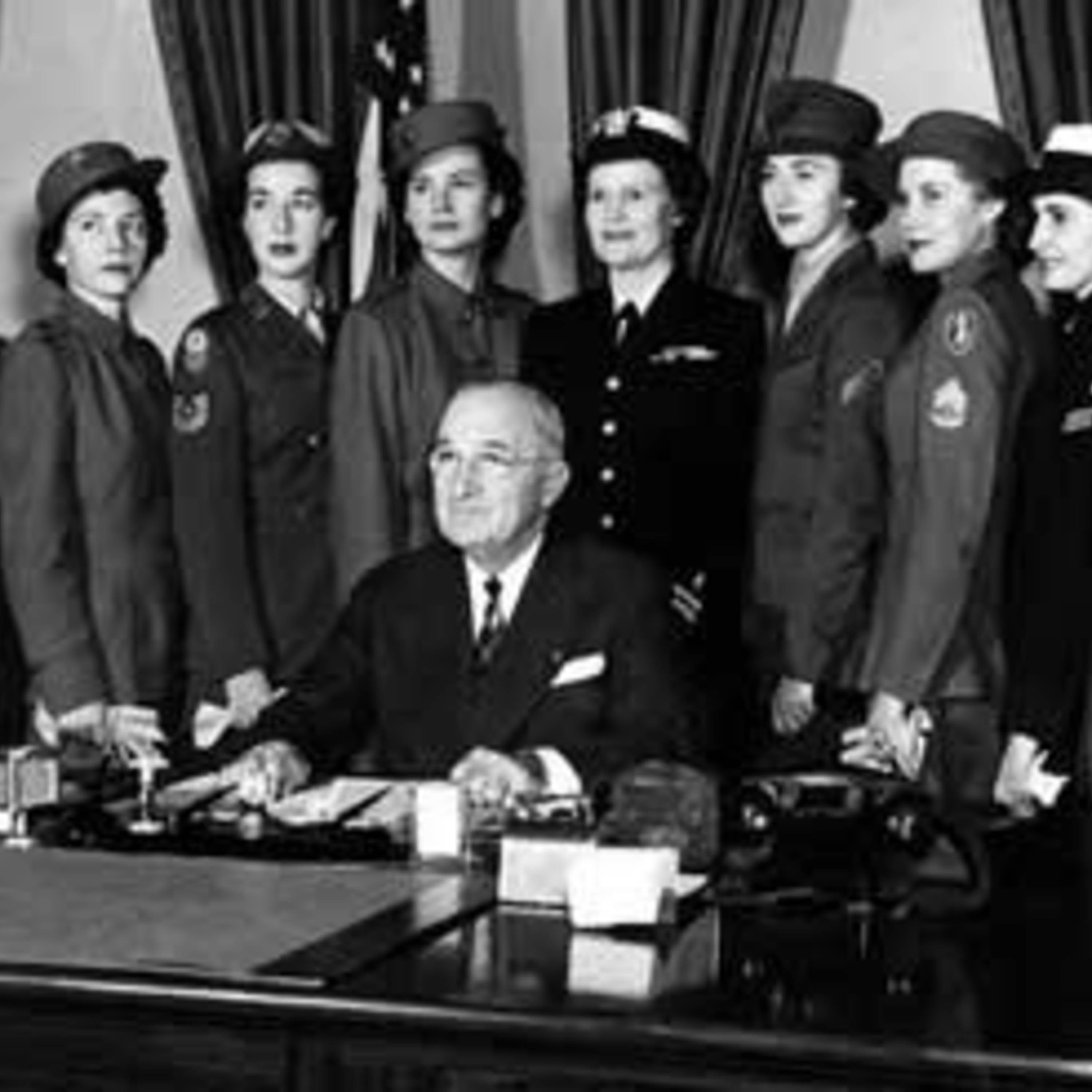 Truman signing Women's Armed Service Integration Act in 1948.jpg