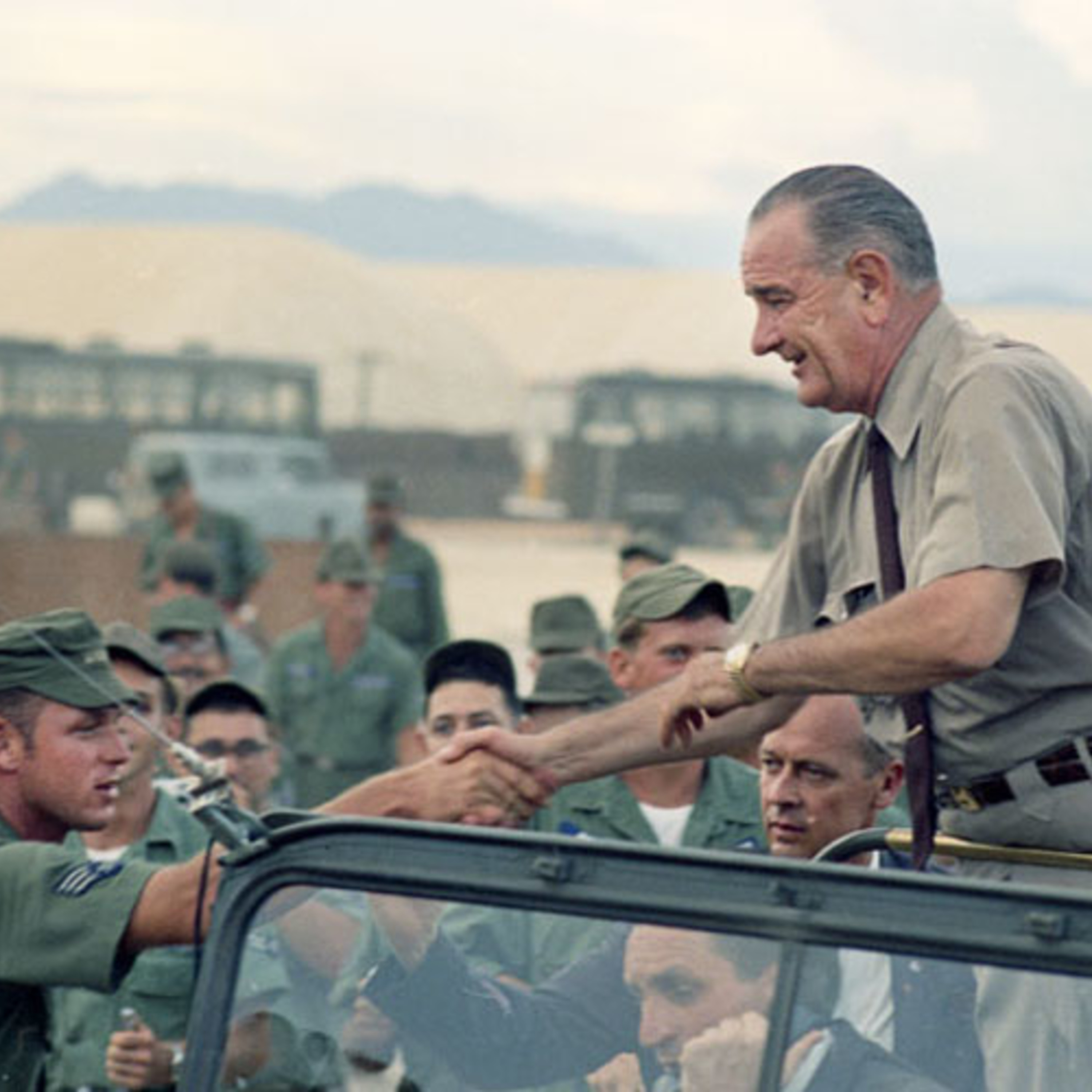 PRESIDENT JOHNSON VISITS U.S. SOLDIERS AT CAM RANH BAY IN SOUTH VIETNAM
